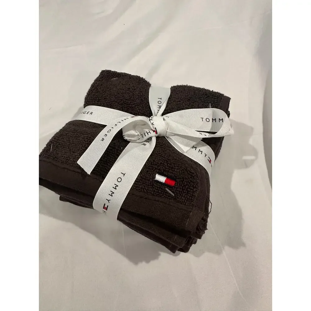 NWT Tommy Hilfiger four piece wash set 13” x 13” brown in color